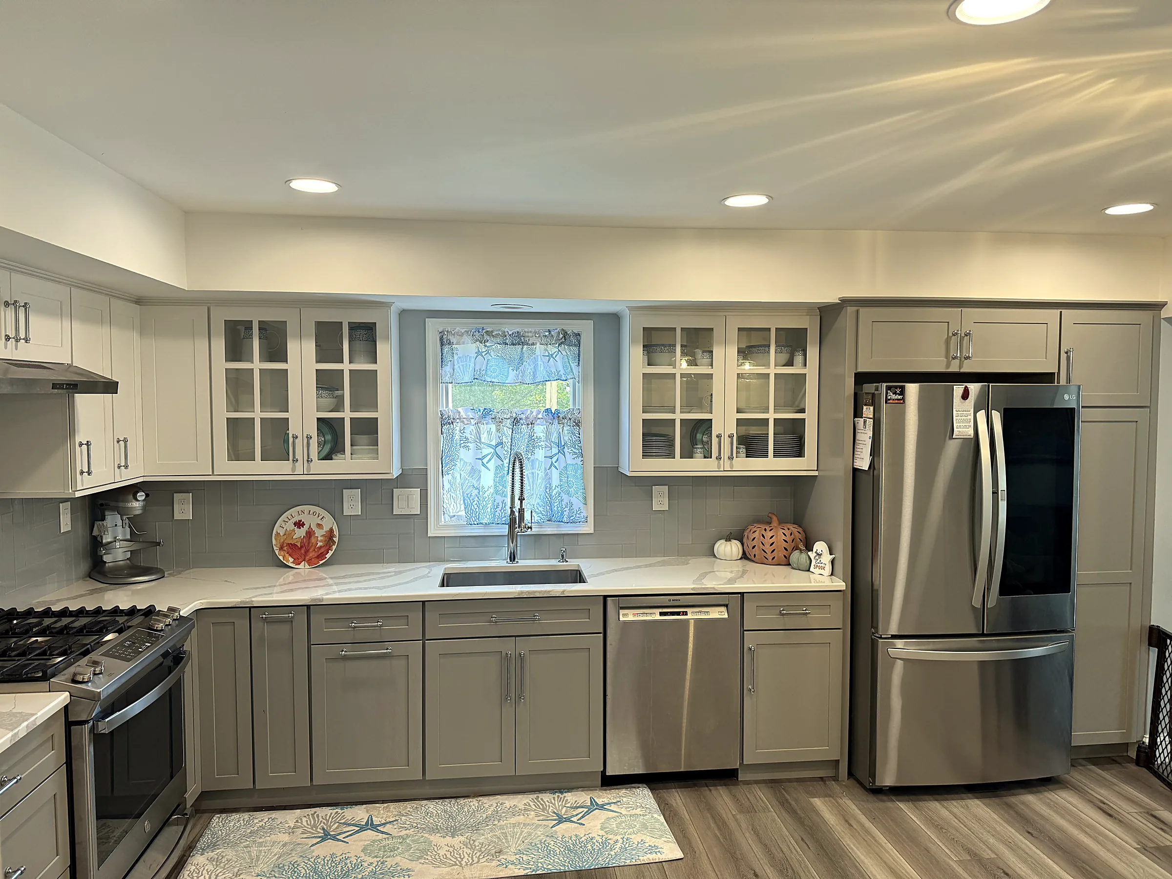 Tired oak kitchen to bright shaker remodel after
