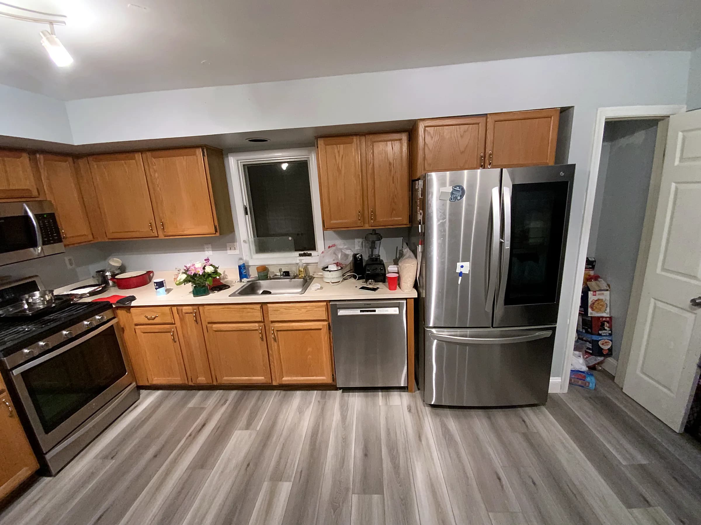 Tired oak kitchen to bright shaker remodel before