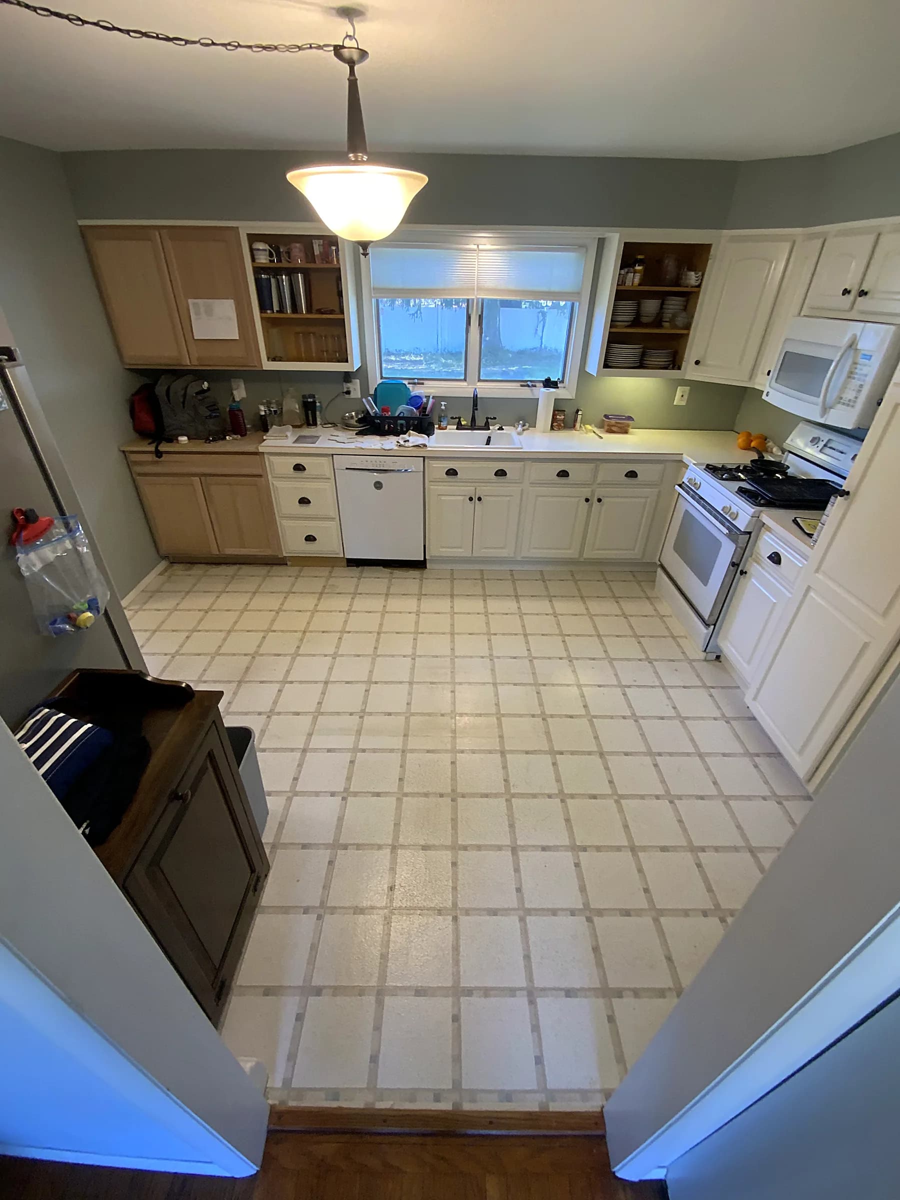 Dated kitchen, brightened to warm white before