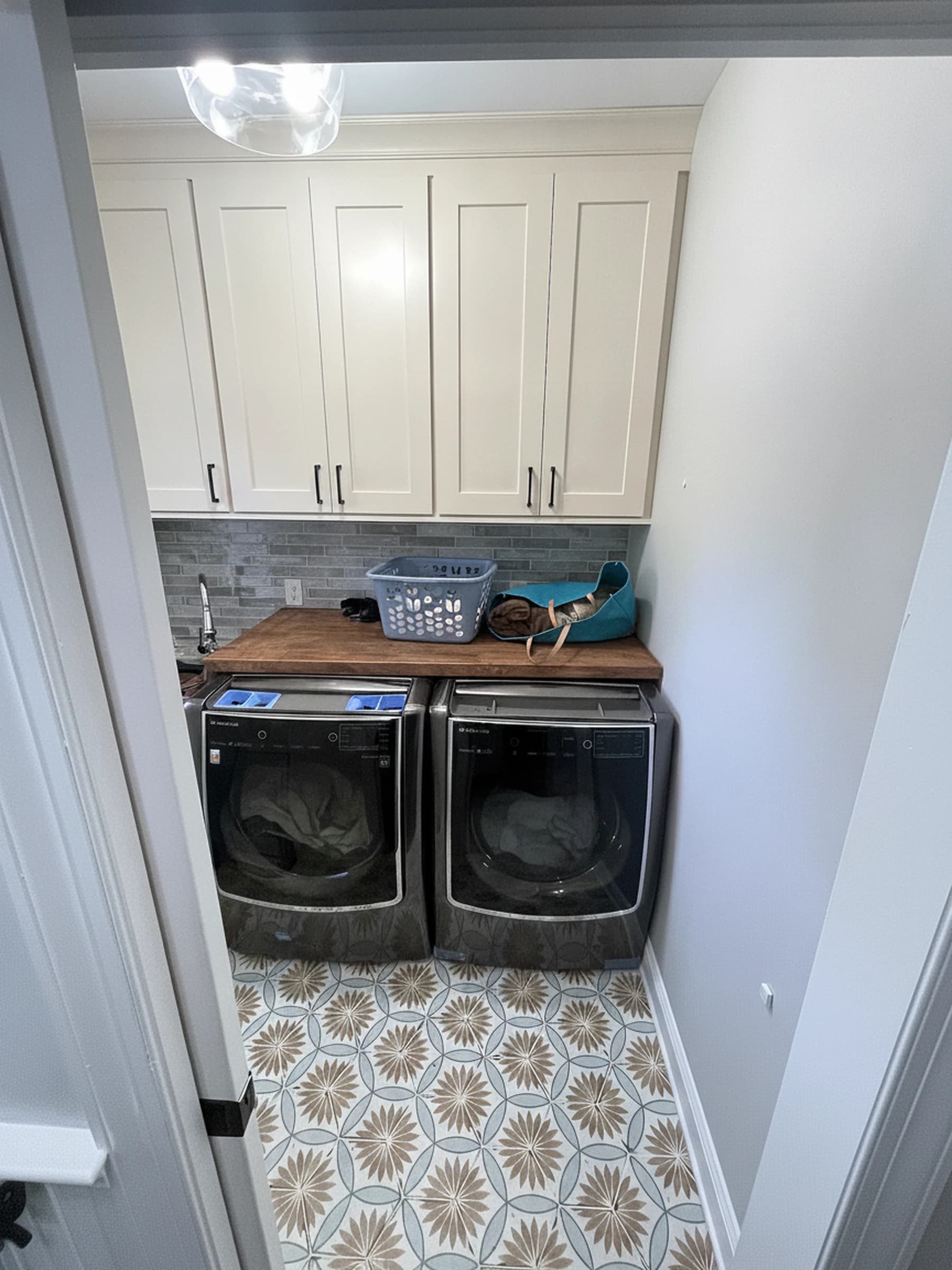Laundry room makeover with built-ins after
