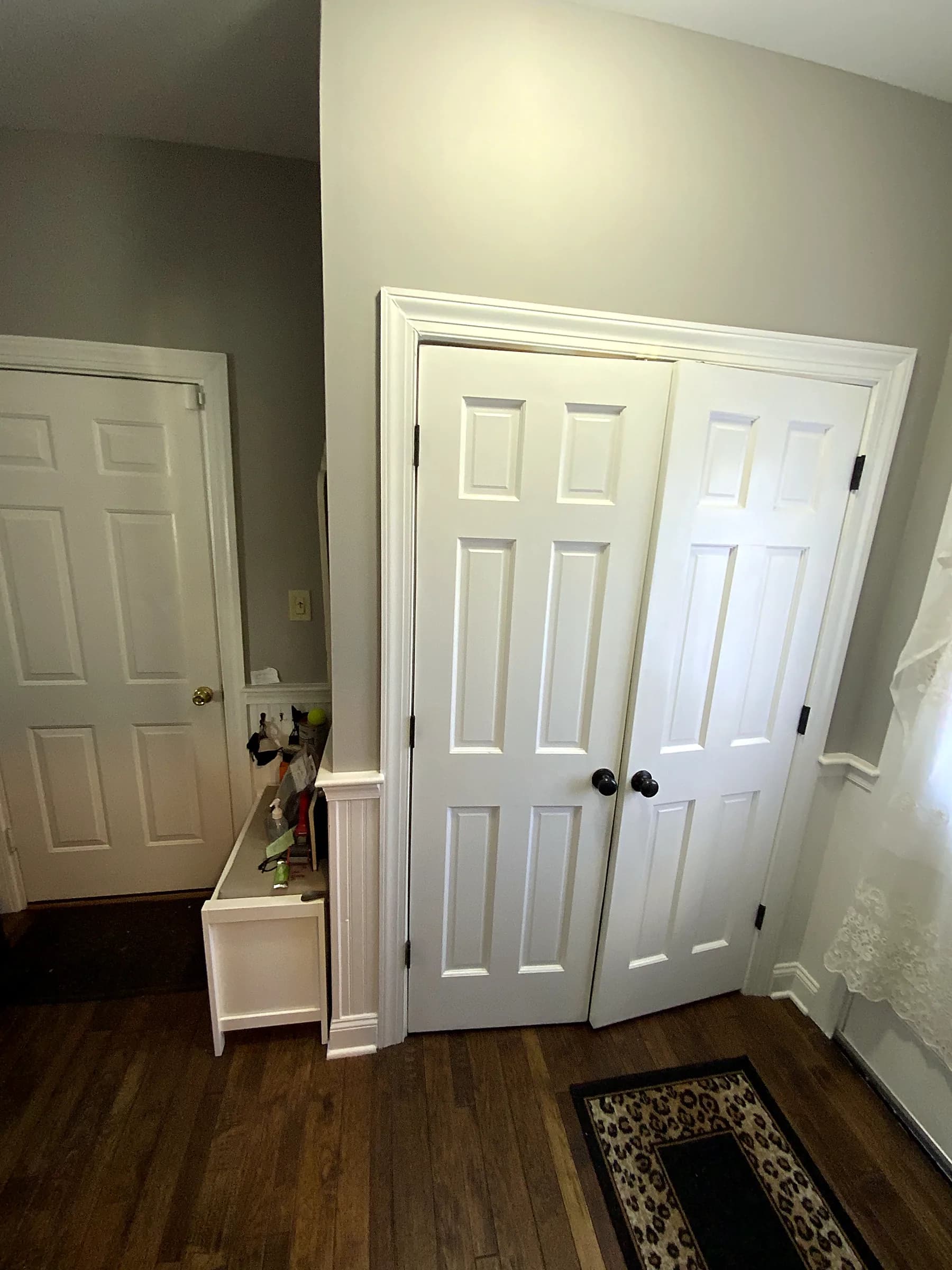 Laundry room makeover with built-ins before